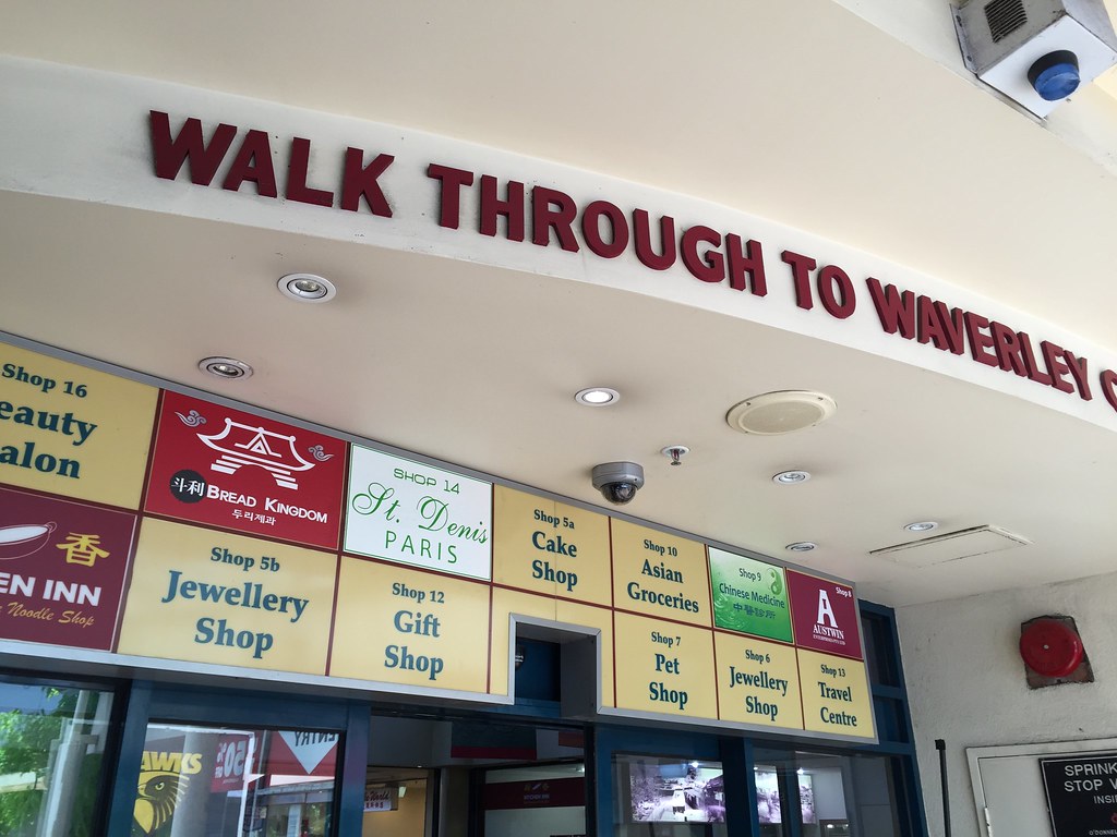 Retail storefronts with glazed shopfronts and signage